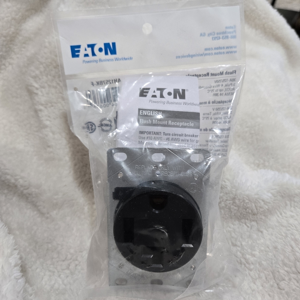 Eaton 30 -Amp 125/250-volt Commercial Round Range power outlet.